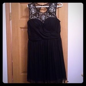 Mid length dress with jewels